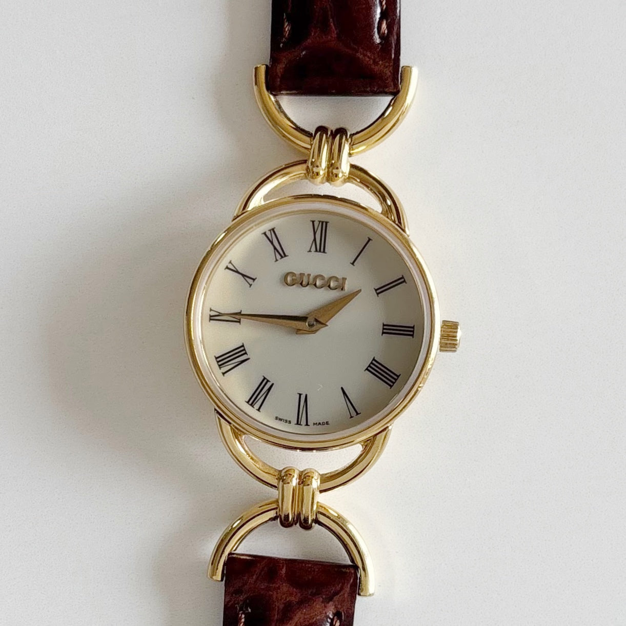 Gucci 1990s Round Dial Gold Plated Horsebit Watch