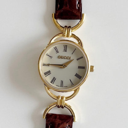 Gucci 1990s Round Dial Gold Plated Horsebit Watch