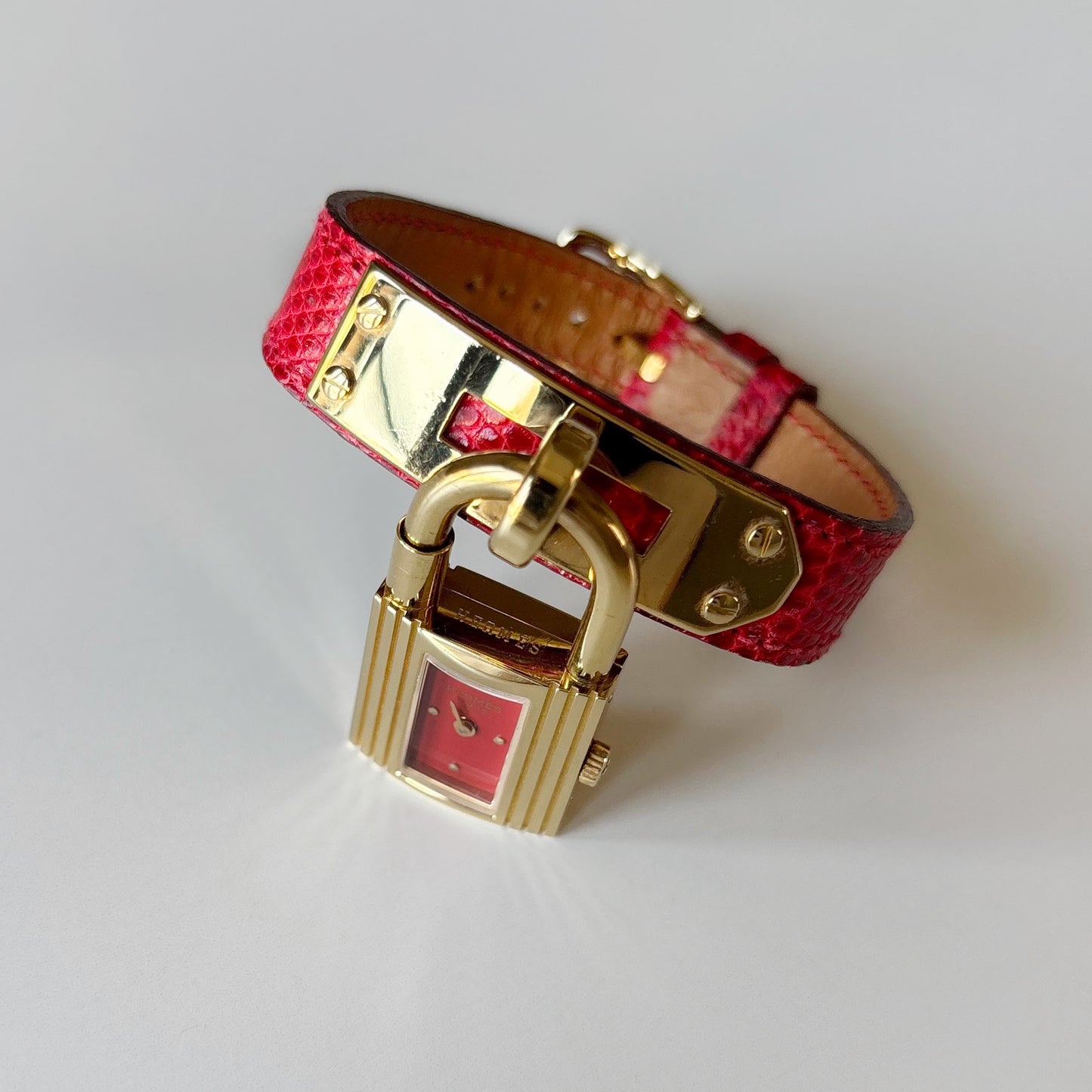 Hermes 1990s Kelly Red Dial Gold Plated Watch