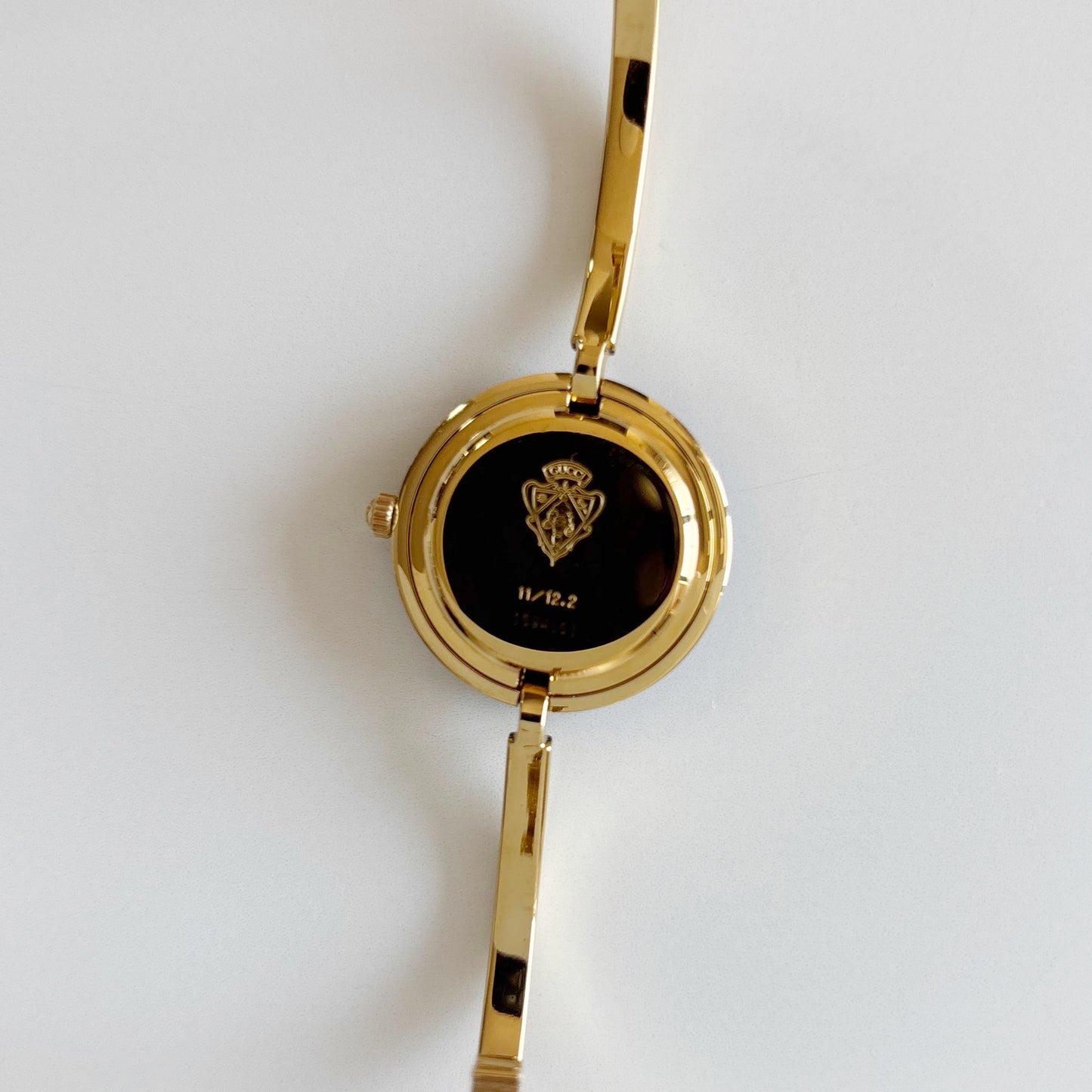 Gucci 1990s Interchangeable Bezel Gold Plated Bangle Watch with 12 bezels, case