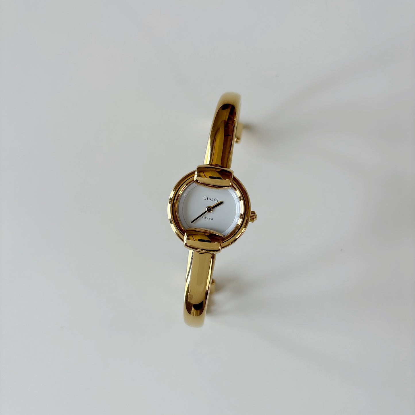 Gucci 1990s Round Dial Gold Plated Bangle Watch