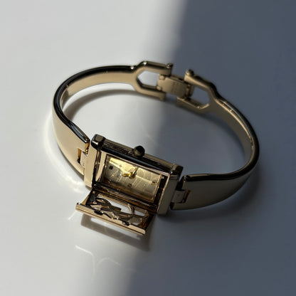 Yves Saint Laurent 1990s Peek-A-Boo Gold Plated Bangle Watch