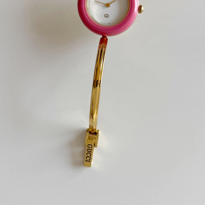 Gucci 1990s Interchangeable Bezel Gold Plated Bangle Watch with 12 bezels, case (Small)