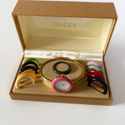 Gucci 1990s Interchangeable Bezel Gold Plated Bangle Watch with 12 bezels, case