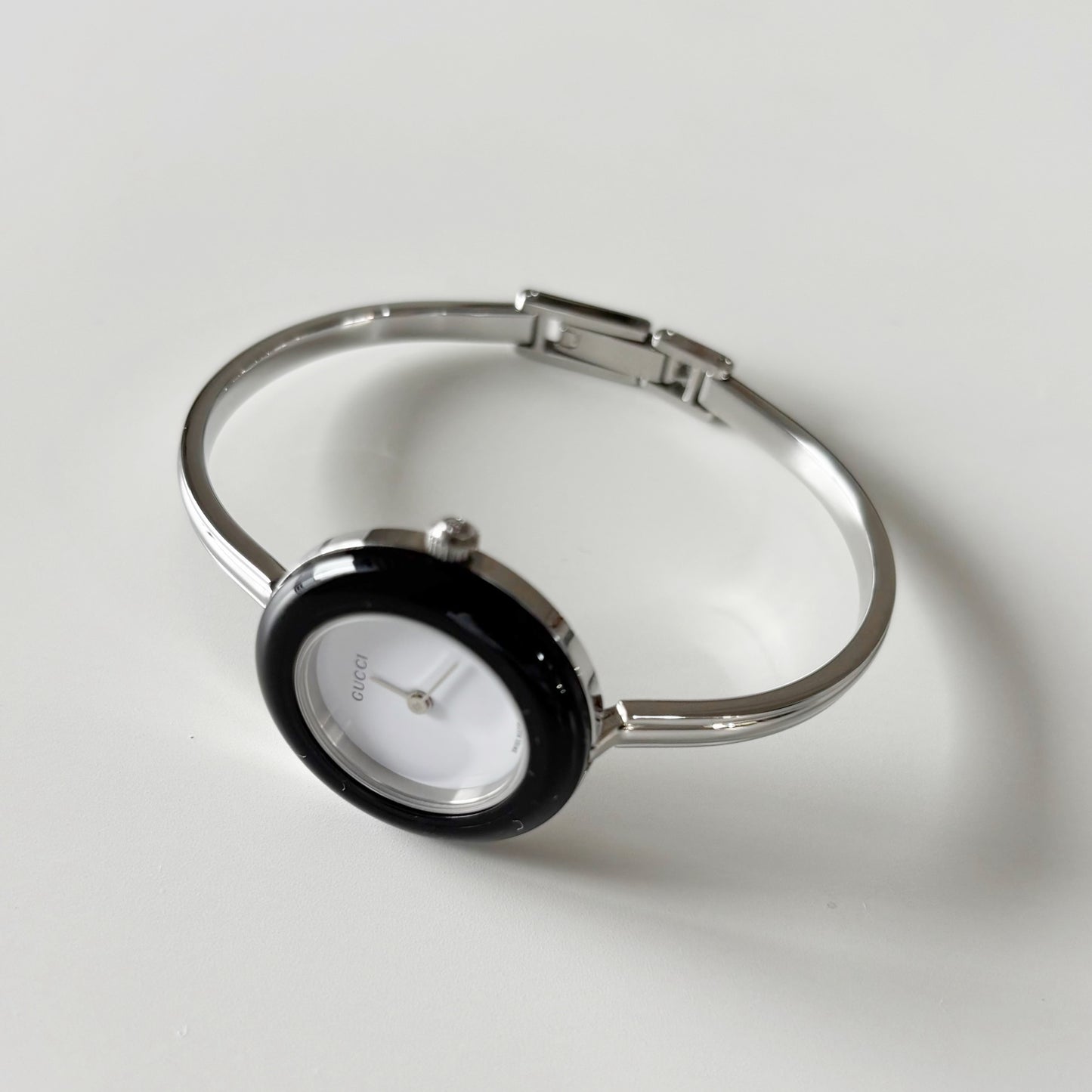 Gucci 1990s Interchangeable Bezel Stainless steel Bangle Watch with 12 bezels, case