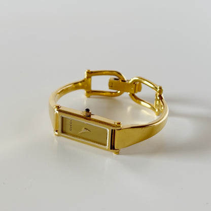 Gucci 1990s Gold Dial Gold Plated Bangle Watch (Small)