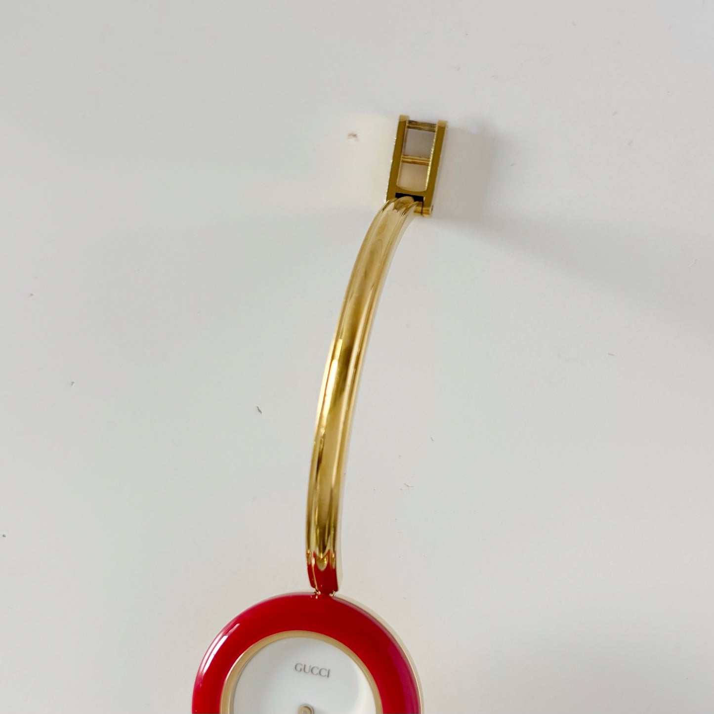 Gucci 1990s Interchangeable Bezel Gold Plated Bangle Watch with 12 bezels, case