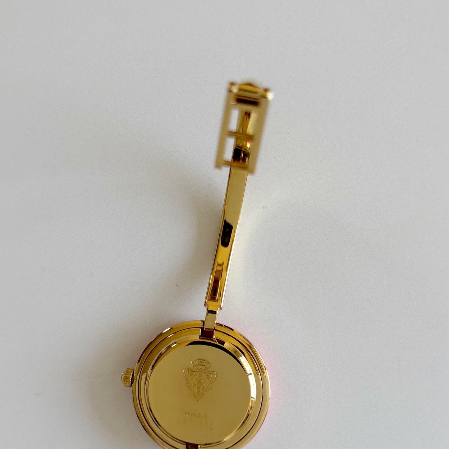Gucci 1990s Interchangeable Bezel Gold Plated Bangle Watch with 12 bezels, case