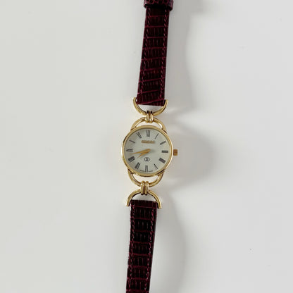 Gucci 1980s Cream Round Dial Horsebit Gold-Plated Watch