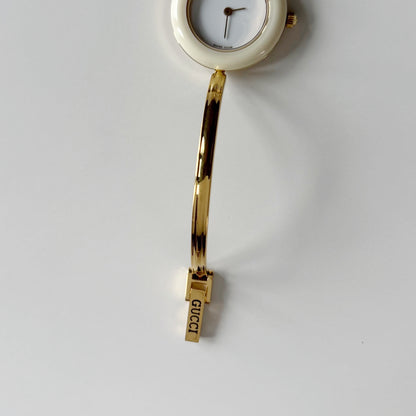 Gucci 1990s Interchangeable Bezel Gold Plated Bangle Watch with 12 bezels, case