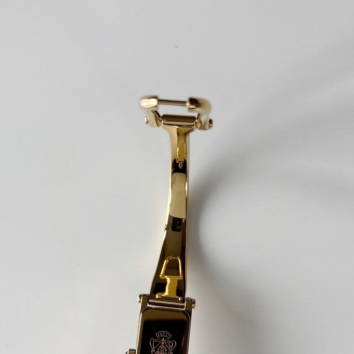 Gucci 1990s Seashell Rectangular Dial Gold Plated Bangle Watch