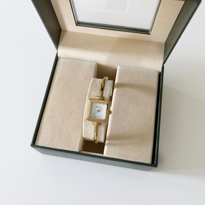 Gucci 1990s Square Dial Gold Plated Bangle Watch