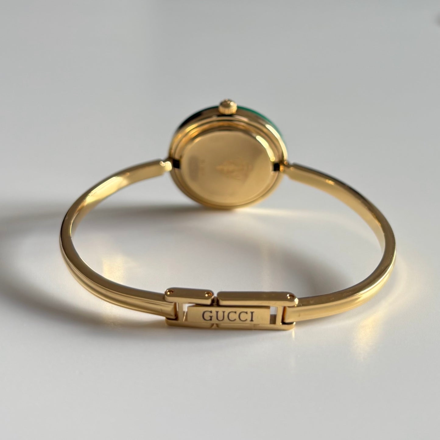 Gucci 1990s Interchangeable Bezel Gold Plated Bangle Watch with 12 bezels, case