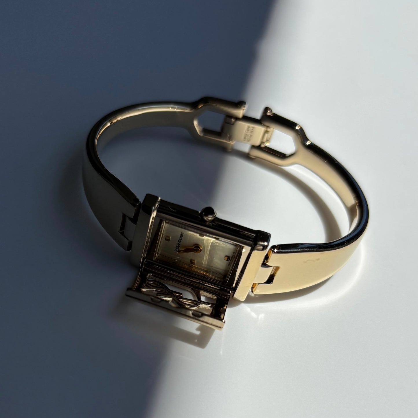 Yves Saint Laurent 1990s Peek-A-Boo Gold Plated Bangle Watch