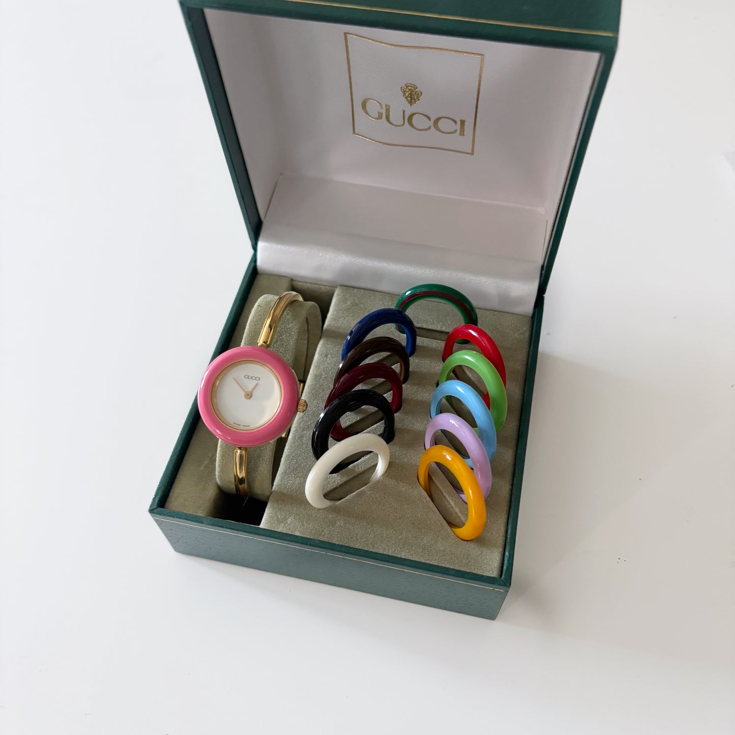 Gucci 1990s Interchangeable Bezel Gold Plated Bangle Watch with 12 bezels, case