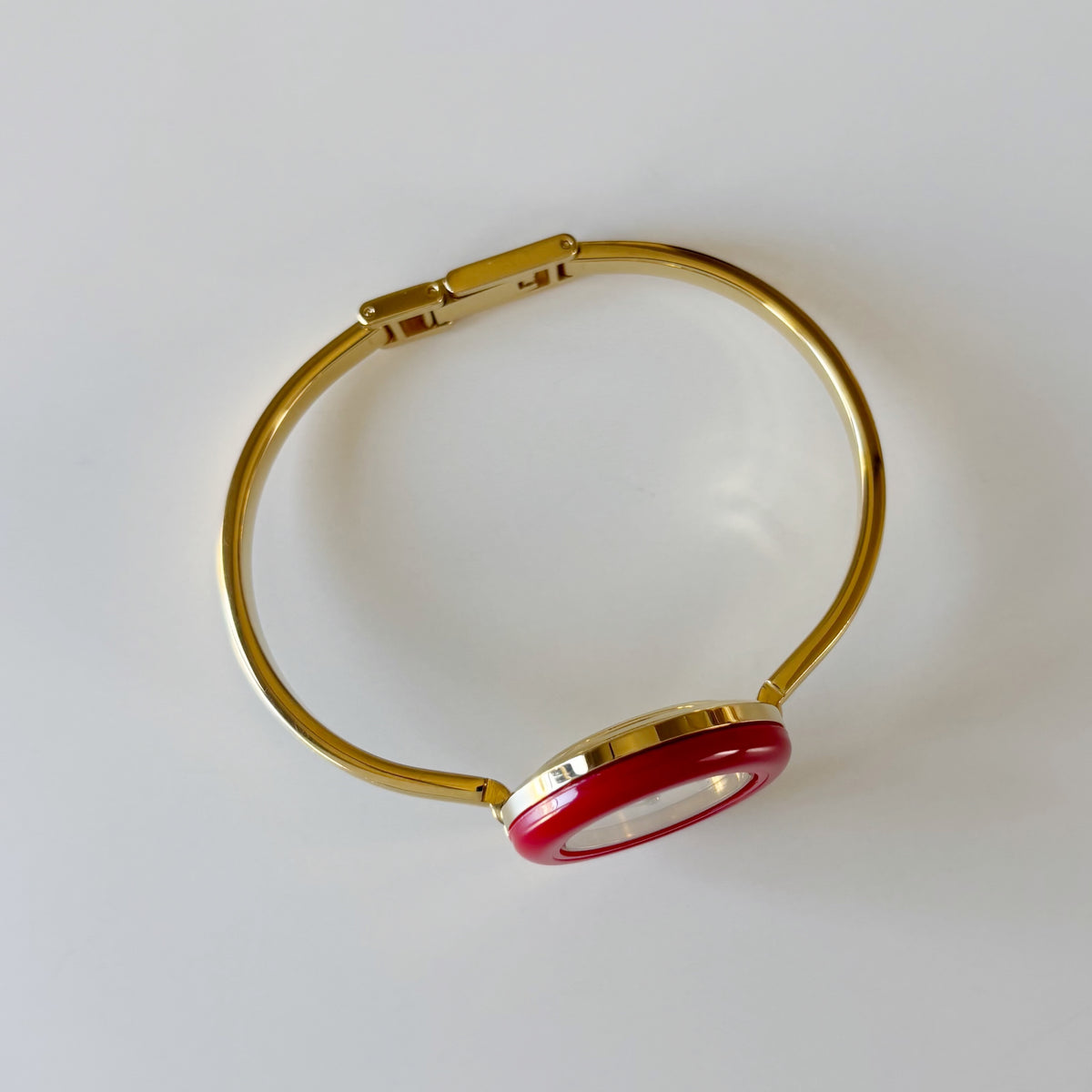 Gucci 1990s Interchangeable Bezel Gold Plated Bangle Watch with 12 bezels, case