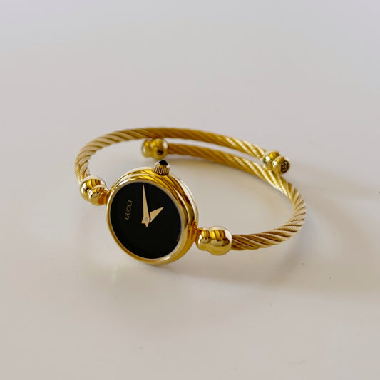 Gucci 1990s Black Dial Gold Plated Cable Bangle Watch