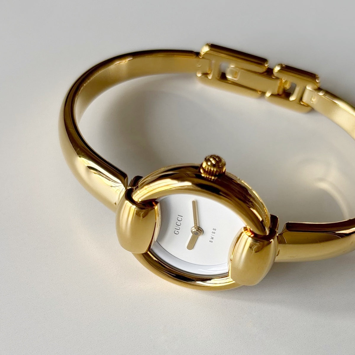 Gucci Round Dial Gold-Plated Bangle Watch