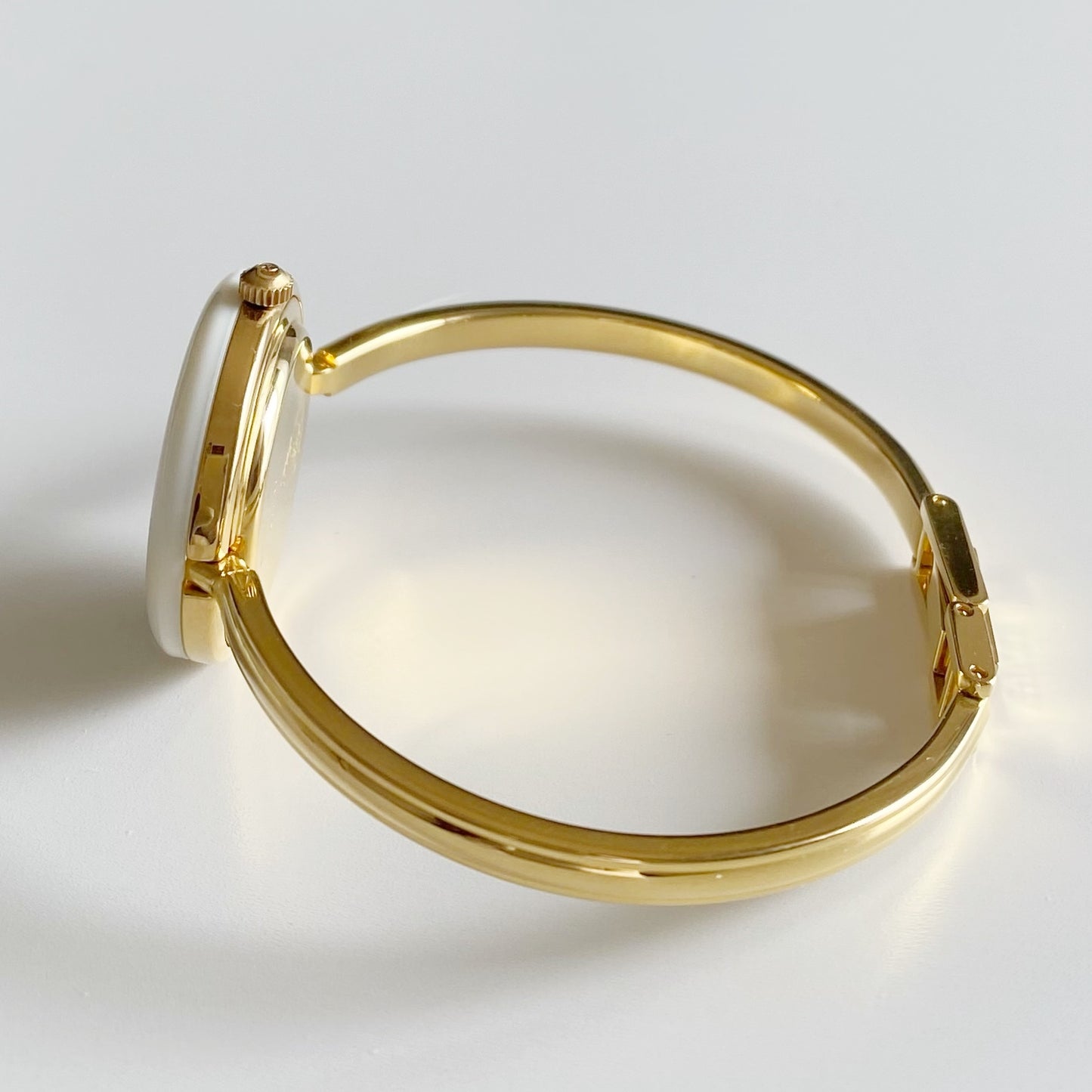 Gucci 1990s Interchangeable Bezel Gold Plated Bangle Watch with 12 bezels, case