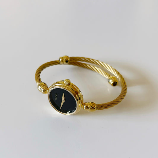 Gucci 1990s Black Dial Gold Plated Bangle Watch