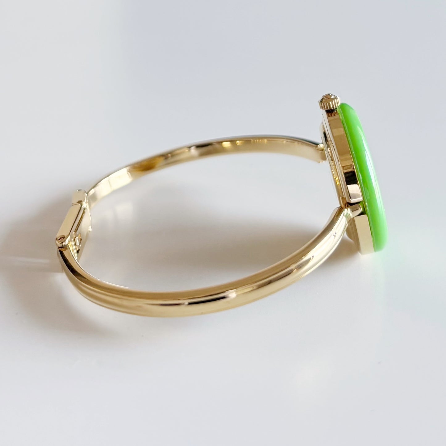 Gucci 1990s Interchangeable Bezel Gold Plated Bangle Watch with 12 bezels, case