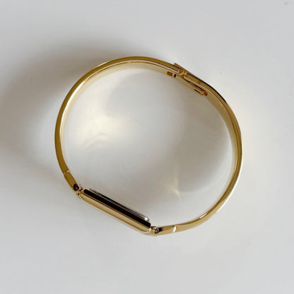 Givenchy 1990s Black Dial Gold Plated Bangle Watch