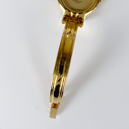 Givenchy 1990s Gold Plated Round Bangle Watch