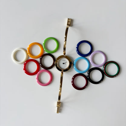 Gucci 1990s Interchangeable Bezel Gold Plated Bangle Watch with 12 bezels, case