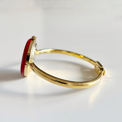 Gucci 1990s Interchangeable Bezel Gold Plated Bangle Watch with 12 bezels, case