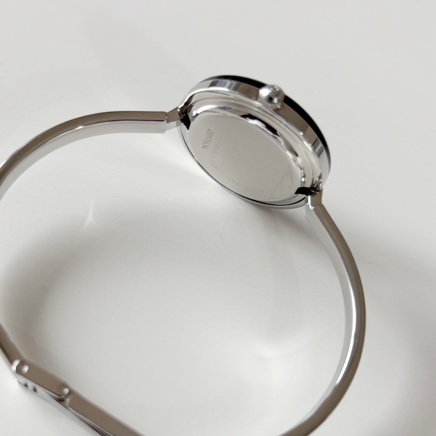 Gucci 1990s Interchangeable Bezel Stainless steel Bangle Watch with 12 bezels, case