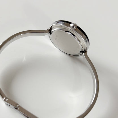 Gucci 1990s Interchangeable Bezel Stainless steel Bangle Watch with 12 bezels, case