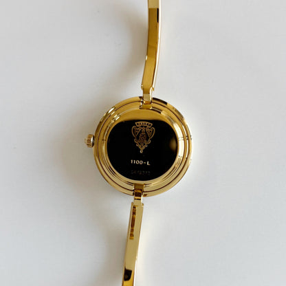 Gucci 1990s Interchangeable Bezel Gold Plated Bangle Watch with 12 bezels, case