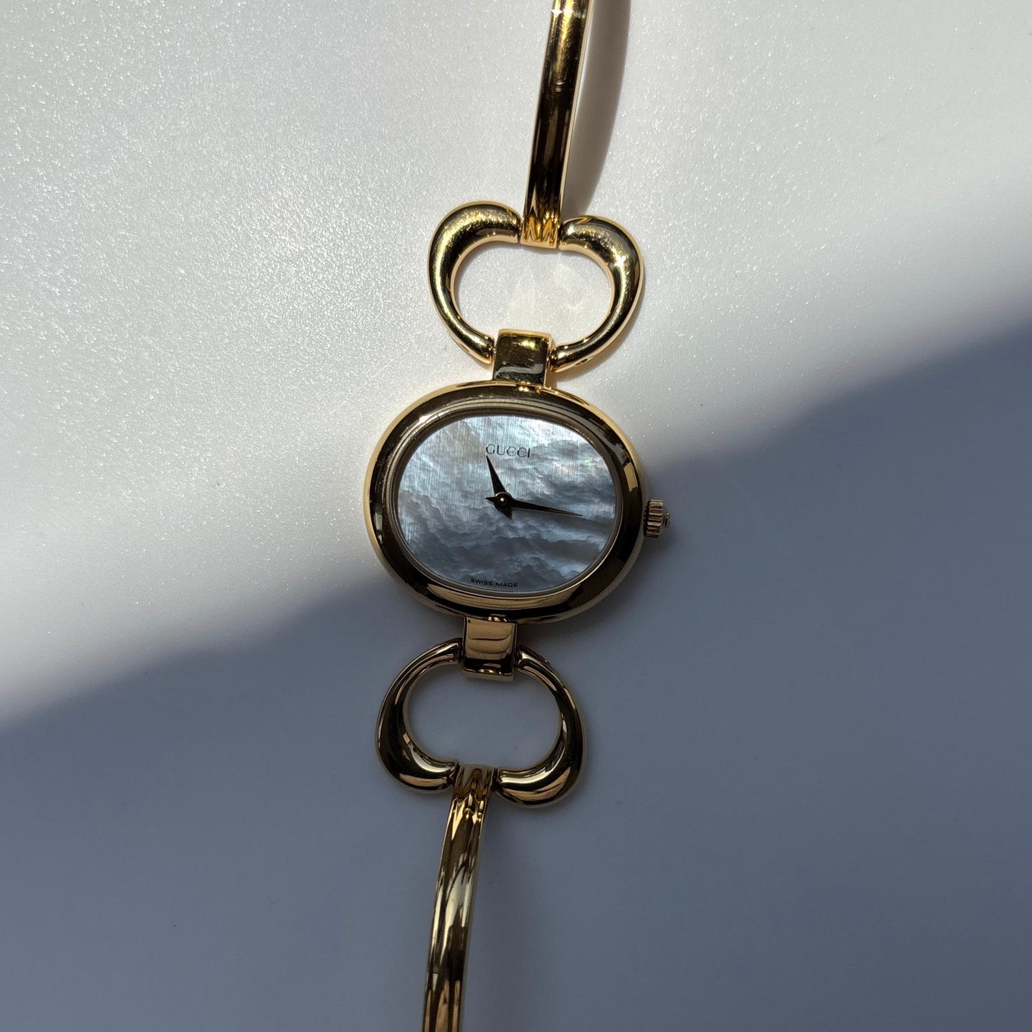 Gucci 1990s Seashell Oval Dial Gold Plated Bangle Watch (Small)