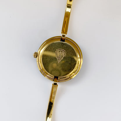 Gucci 1990s Interchangeable Bezel Gold Plated Bangle Watch with 12 bezels, case