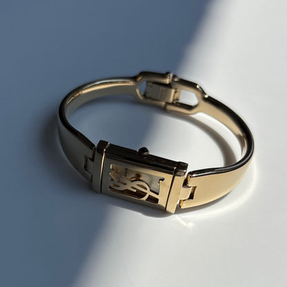 Yves Saint Laurent 1990s Peek a boo Gold Plated Bangle Watch