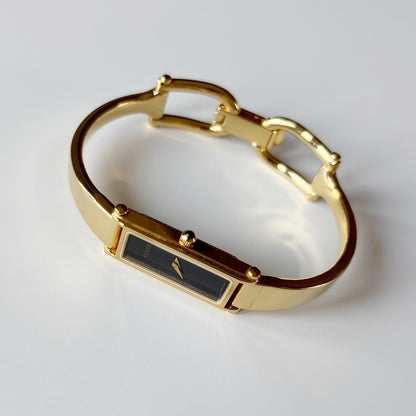 Gucci 1990s Black Dial Gold Plated Bangle Watch