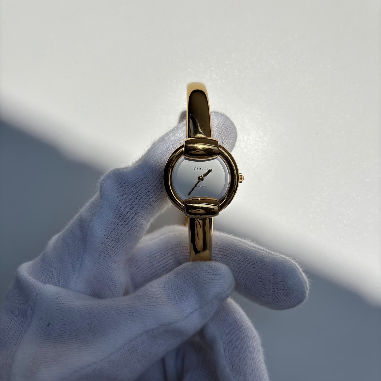Gucci 1990s Round Dial Gold Plated Bangle Watch