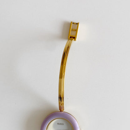 Gucci 1990s Interchangeable Bezel Gold Plated Bangle Watch with 12 bezels, case