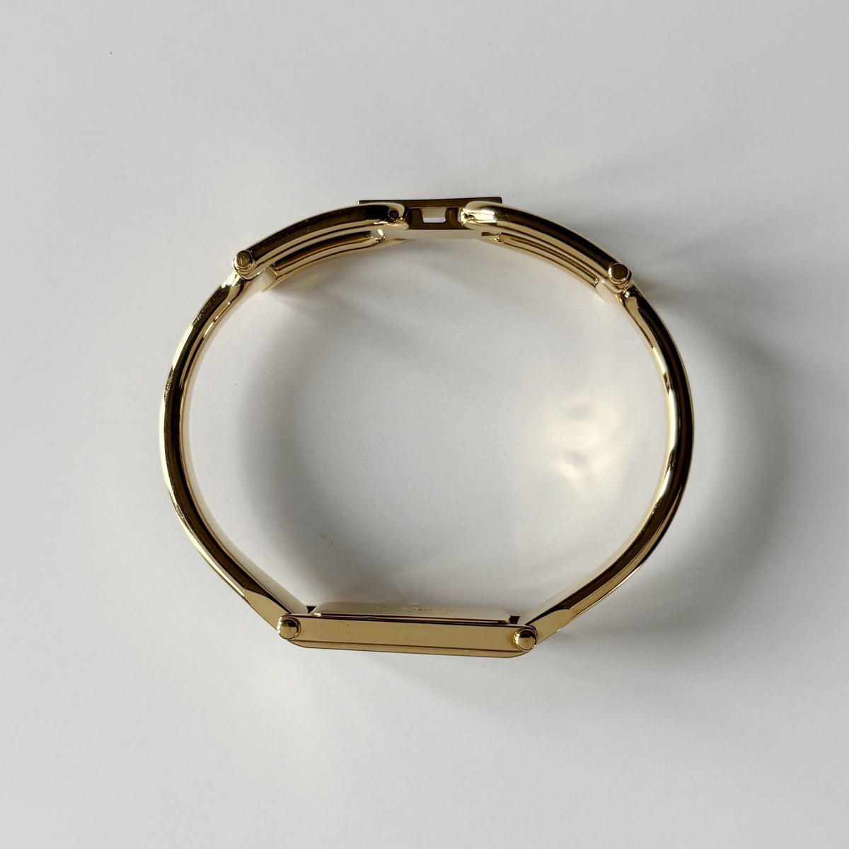 Gucci 1990s Gold Rectangular Dial Gold Plated Bangle Watch