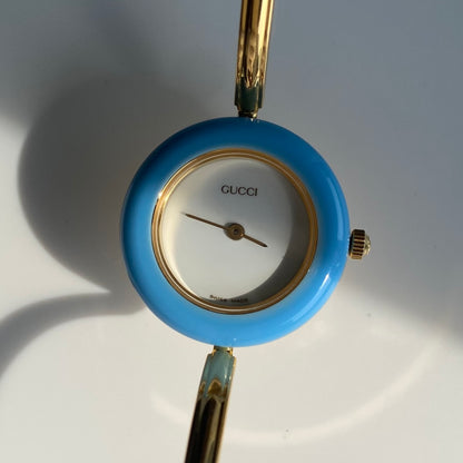 Gucci 1990s Interchangeable Bezel Gold Plated Bangle Watch with 12 bezels, case
