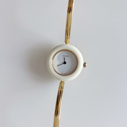 Gucci 1990s Interchangeable Bezel Gold Plated Bangle Watch with 12 bezels, case