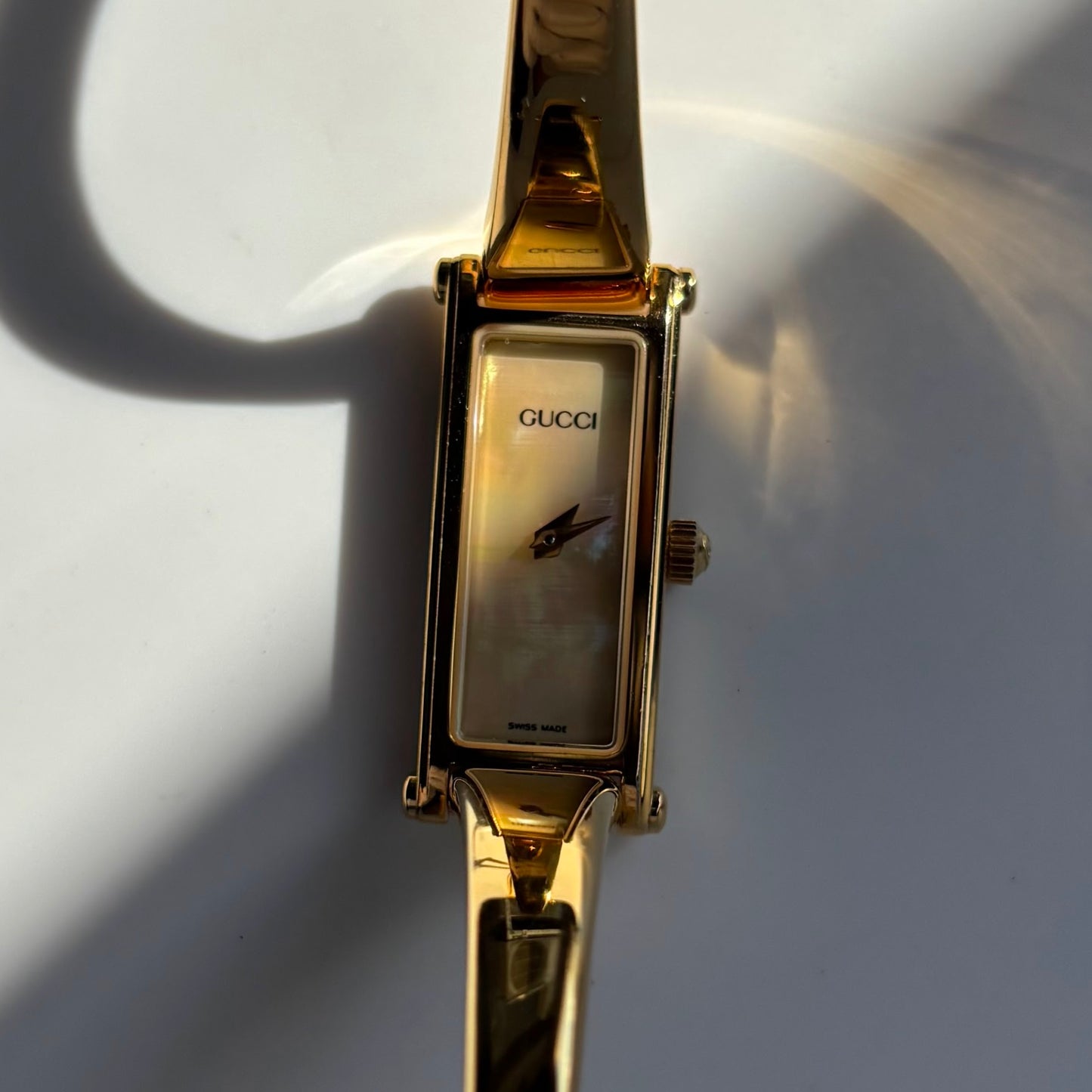 Gucci 1990s Rectangular Seashell Dial Gold Plated Bangle Watch