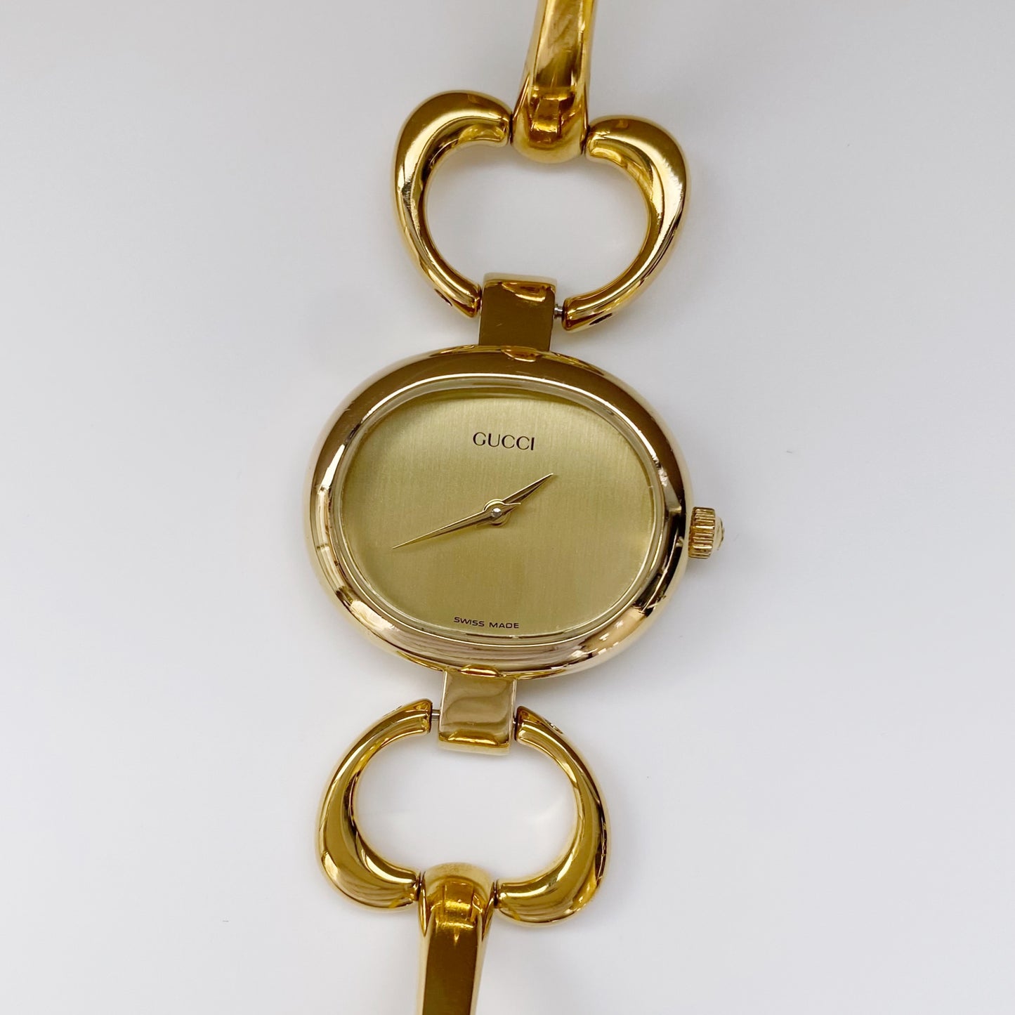 Gucci 1990s Oval Gold Plated Bangle Watch