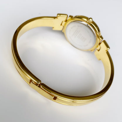 Givenchy 1990s Gold Plated Round Bangle Watch