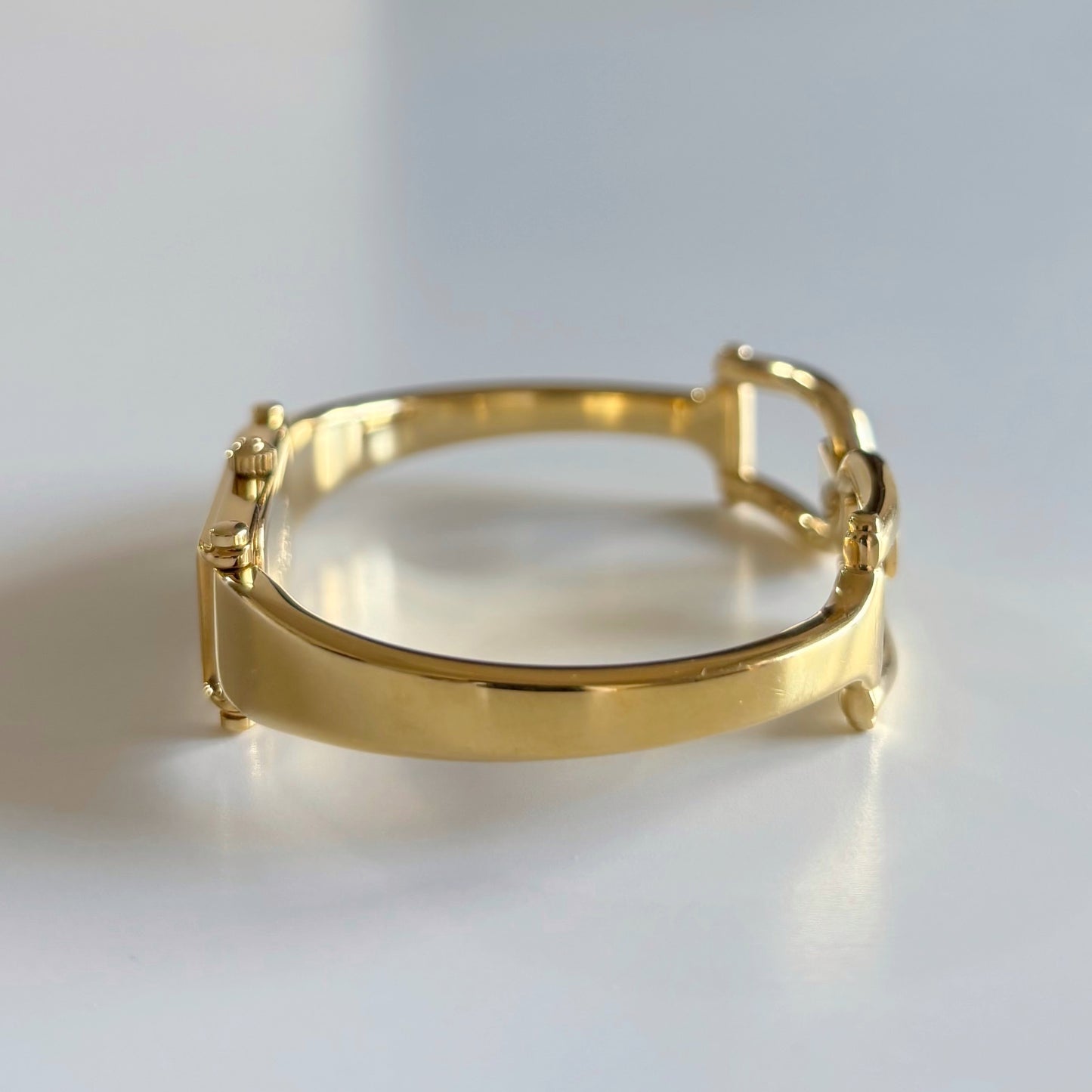 Gucci 1980s Rectangular Gold Dial Gold Plated Bangle Watch