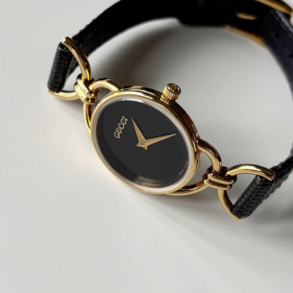 Gucci 1990s Black Dial Horsebit Gold Plated Watch