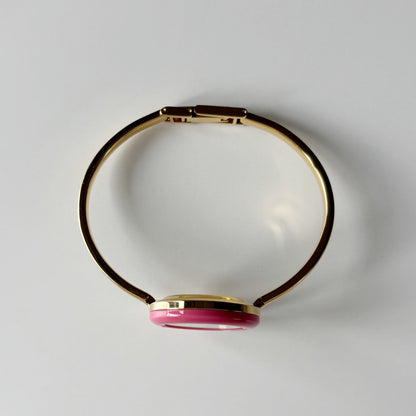Gucci 1990s Interchangeable Bezel Gold Plated Bangle Watch with 12 bezels, case