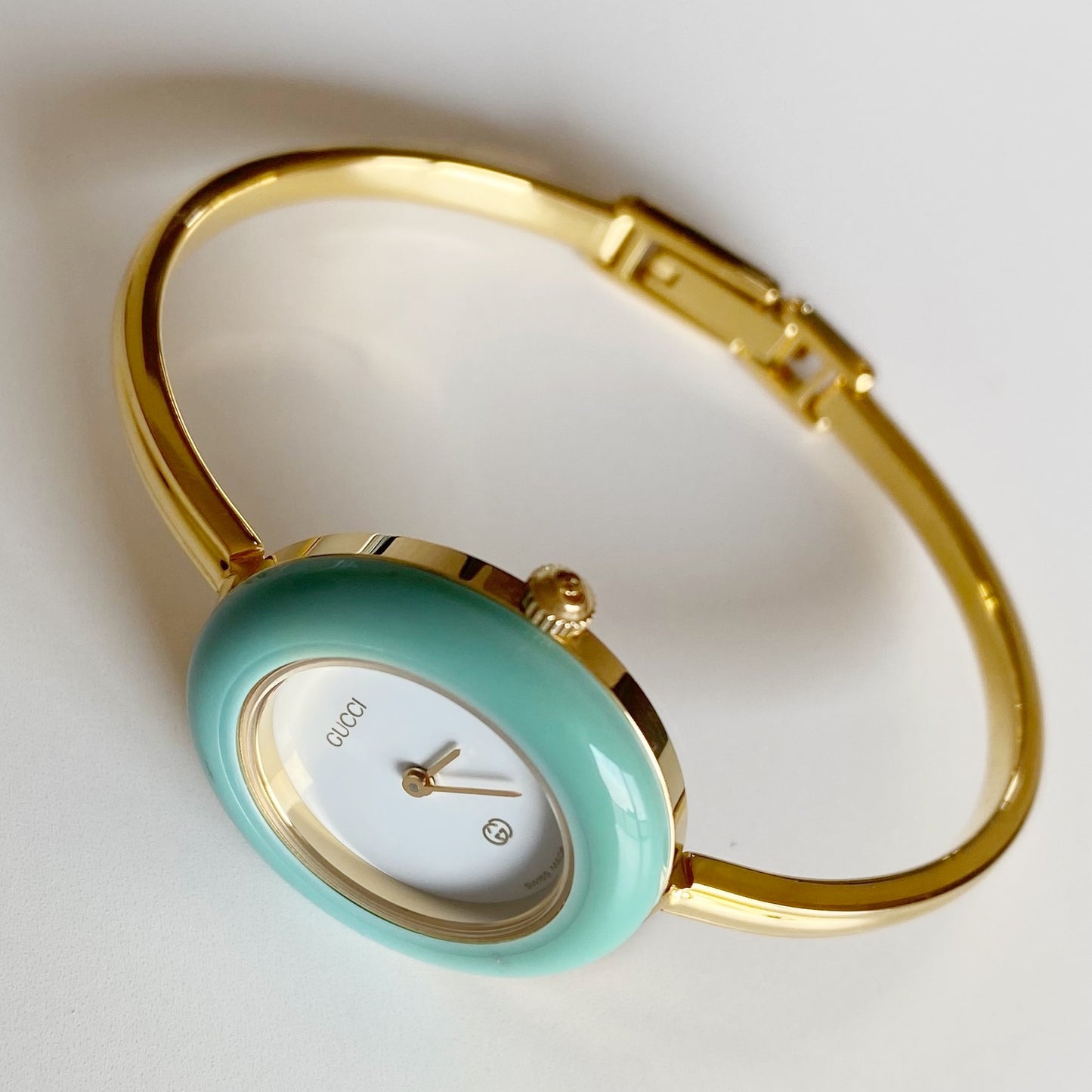 Gucci 1990s Interchangeable Bezel Gold Plated Bangle Watch with 12 bezels, case