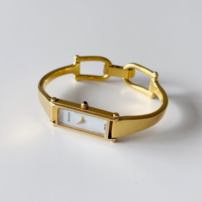 Gucci 1990s Seashell Dial Rectangular Gold Plated Bangle Watch