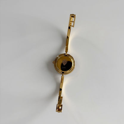 Gucci 1990s Interchangeable Bezel Gold Plated Bangle Watch with 12 bezels, case